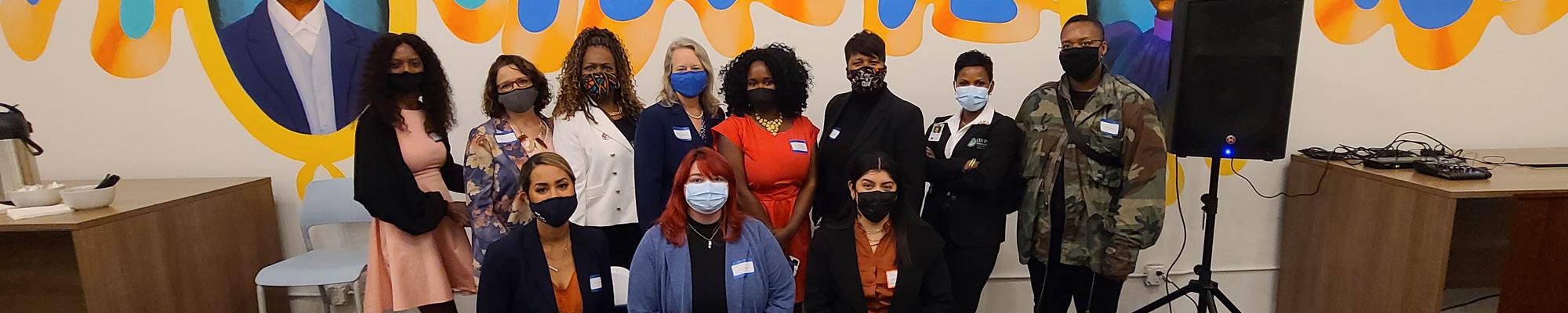 Group of 2021 Changemakers in front of wall at the Blake Annex