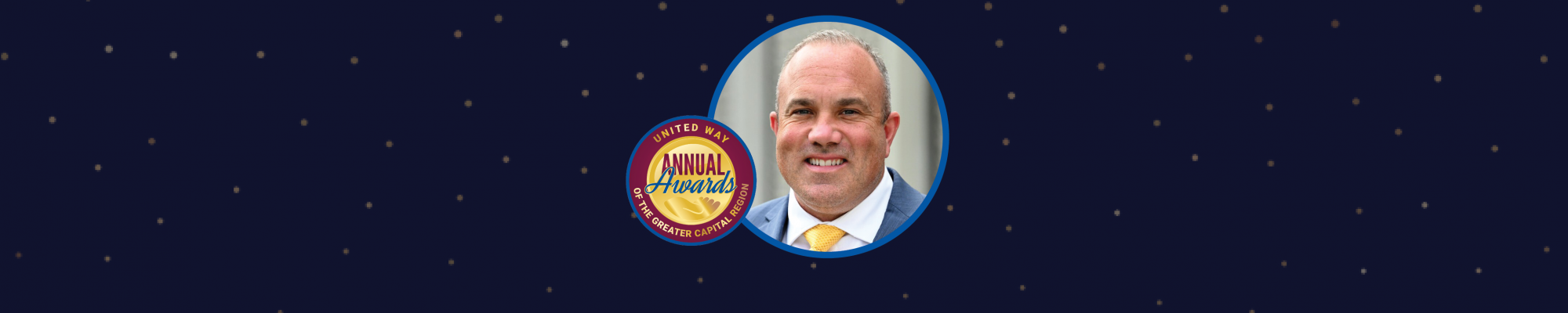 Nathan Writer headshot in circle with Annual Awards logo