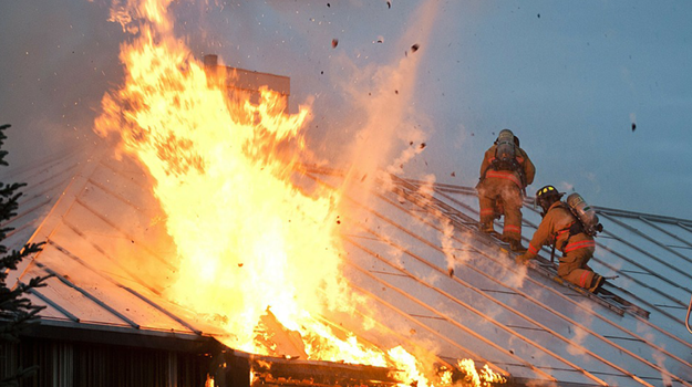 Firemen putting out fire