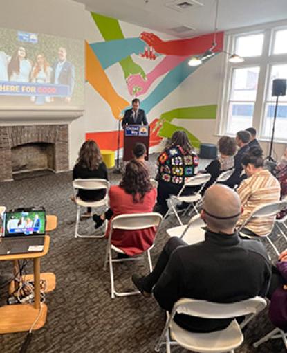 People listening at press conference